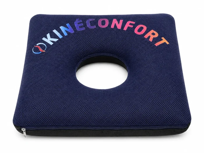 Coussin KinéConfort vu de face, ouverture centrale de quinze centimètres au milieu de l’assise